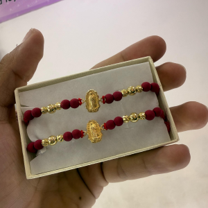 Pulsera tejida y neopreno herraje virgen de Guadalupe 0,5gr y baló­n oro 18k liso 4mm y Diamnatado 5m