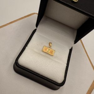 Dije Dollar 0,58 gr/Oro 18K Nacional